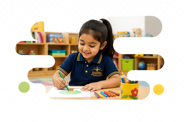 Child doing creative art activity at Vasishtha School
